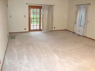Country home with asphalt drive on nearly 12 acres with woods and outbuildings.  1-1/2 Story remodeled farm home with 3 bedrooms, 2 baths, eat-in kitchen w/custom hickory cabinets (J. Miller) and all appliances including washer and dryer.

Spacious living/dining room, full concrete block basement, covered front porch, rear deck and extra deep 2-car garage.

Quiet location convenient to town. - Country Home on 3.5 Acres